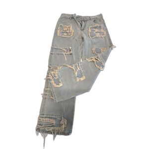 Men’s Distressed Light-Wash Denim Jeans with Unique Frayed Patch Design